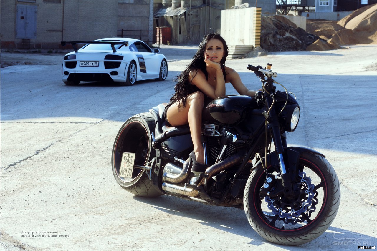 Sexy model Brunettes on a motorcycle in Kashgar